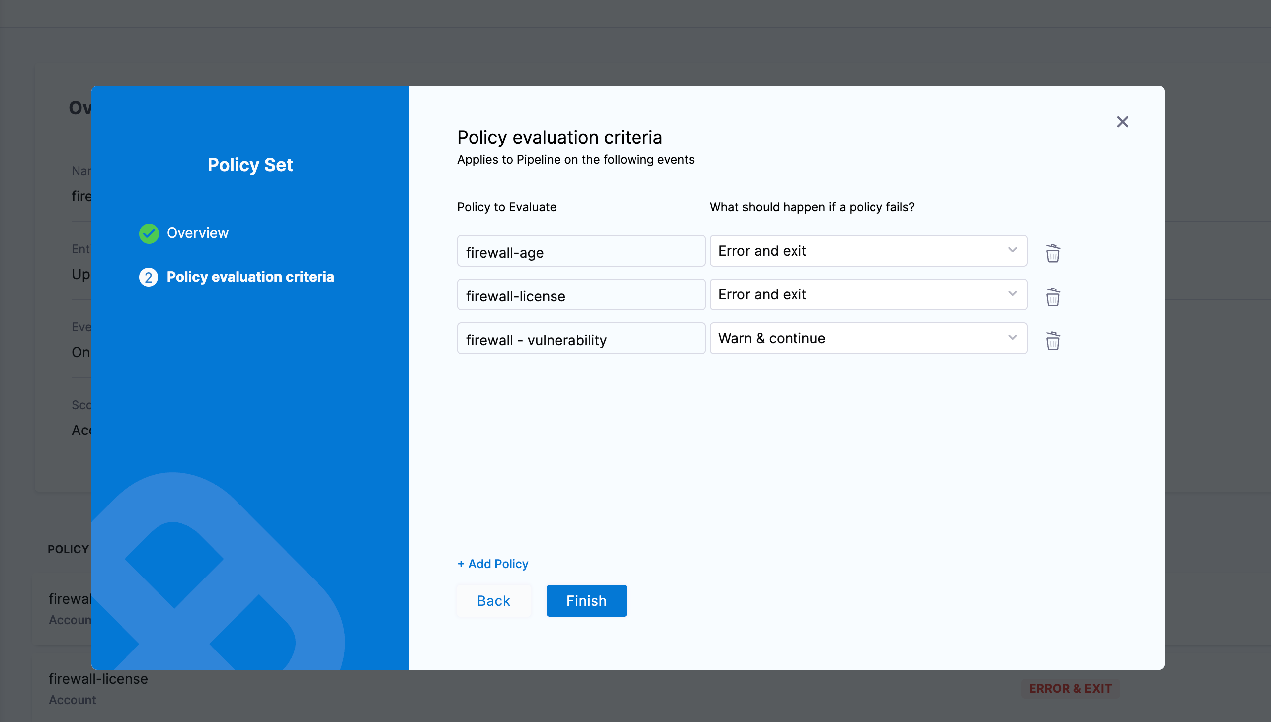 Policy evaluation criteria step in the Policy Set wizard, showing three policies (firewall-age, firewall-license, firewall-vulnerability) each with a fail action dropdown set to Error and exit or Warn & continue